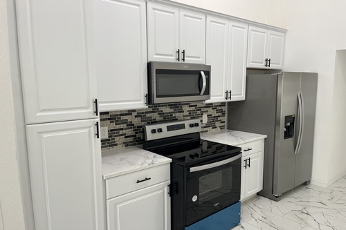 Newly installed kitchen cabinets